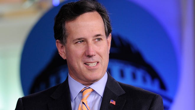 Rick Santorum is photographed at USA TODAY's headquarters on June 12, 2014.