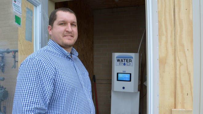 Algoma Schools Superintendent Nick Cochart is one of the residents using free water from a kiosk at Algoma High.
A kiosk at Algoma High School has provided free drinking water to Kewaunee County residents with polluted wells since February. Algoma School Superintendent Nick Cochart says the kiosk has been vandalized three times.