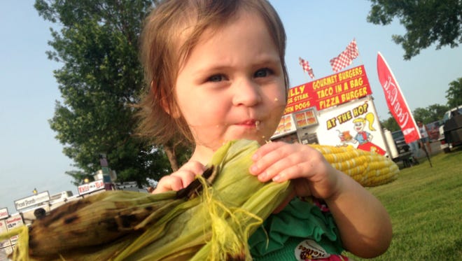 Zella Kortleever, 2, enjoying some corn.