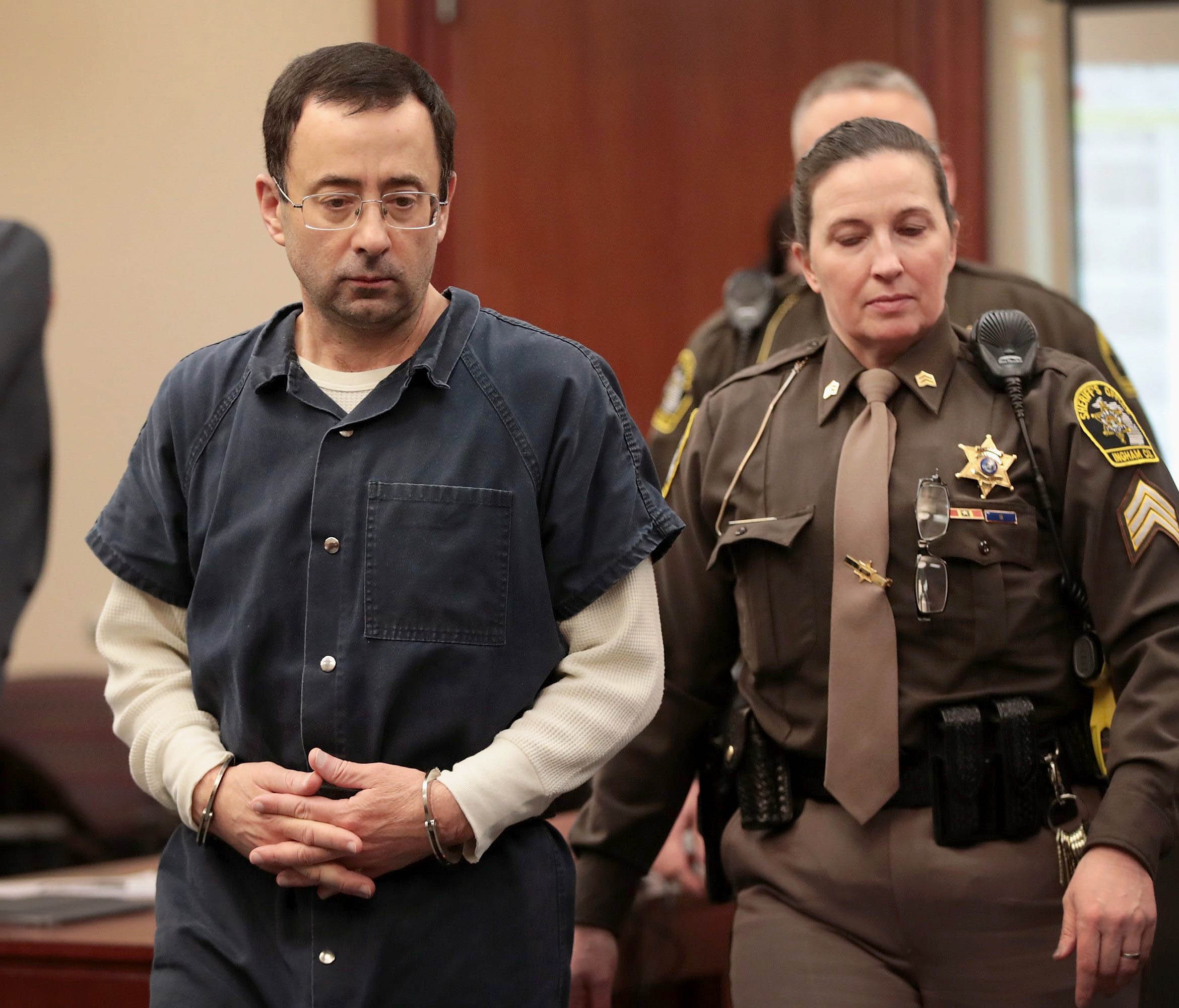 Larry Nassar appears in court on to listen to victim-impact statements prior to being sentenced on January 16, 2018 in Lansing.