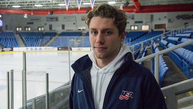 Northville's Dylan St. Cyr proudly stands inside USA Hockey Arena in Plymouth, where he has been a standout the past two seasons with the National Team Development Program.