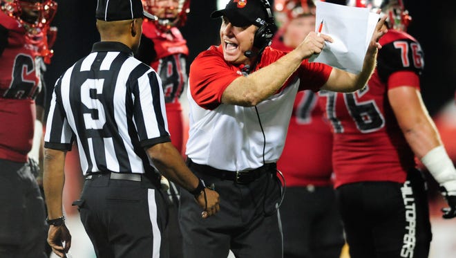 Sep 10, 2015; Bowling Green, KY, USA; Western Kentucky Hilltoppers head coach Jeff Brohm shouts at a referee during the second half against Louisiana Tech Bulldogs at Houchens Industries-L.T. Smith Stadium. Western Kentucky Hilltoppers won 41-38. Mandatory Credit: Joshua Lindsey-USA TODAY Sports