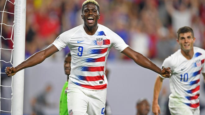 U.S. forward Gyasi Zardes (9) celebrates after scoring a goal against Trinidad and Tobago during the second half of a CONCACAF Gold Cup soccer match Saturday, June 22, 2019, in Cleveland. The United States won 6-0. (AP Photo/David Dermer)