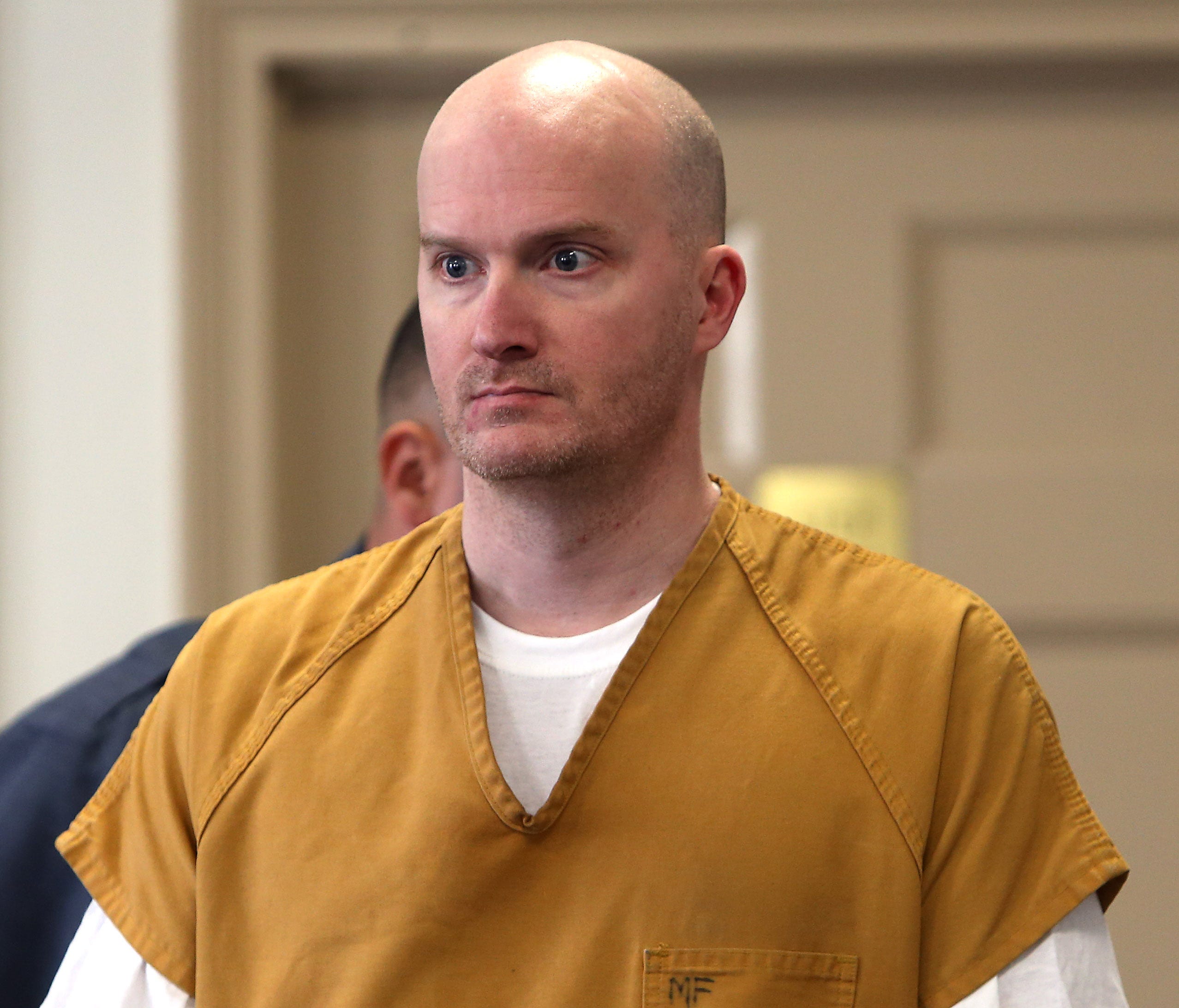 Jason Fennes is led into Morris County Court, pleading guilty to charges of molesting multiple young pupils he taught  in Montville, as well as sexual abuse of a teenage girl he met as an assistant track coach for Butler High School. Fennes was also 