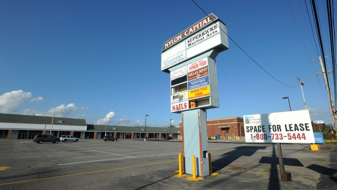 View of the Nylon Capital shopping center in Seaford.  The Invista plant used to be DuPont's nylon factory, which employed 1,200. The parking lot is built to hold 3,000 vehicles.