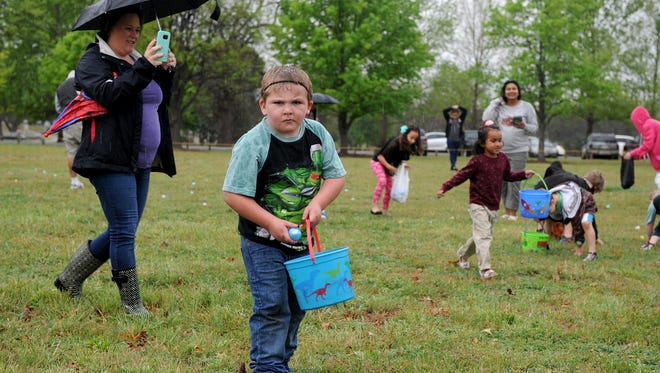 Despite the rain at the Wichita Falls Parks & Recreation Department's annual Easter Egg Hunt Saturday, April 1, 2017, children and their families turned out to hunt for colorful eggs.