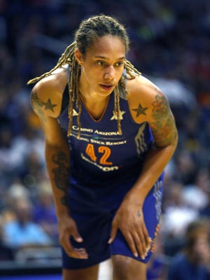 Phoenix Mercury center Brittany Grinner waits on the side during a Dallas Wings free throw at Talking Stick Resort Arena in Phoenix on August 25, 2016.