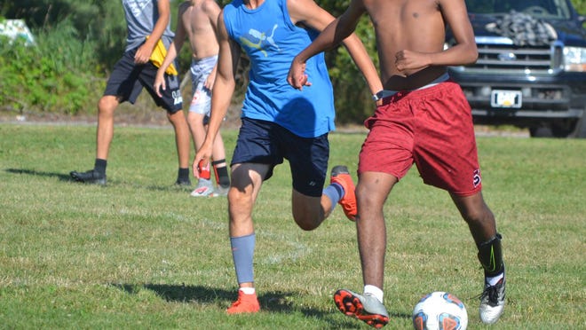 Cheboygan varsity boys soccer players practice at Gordon Turner Park in Cheboygan on Wednesday. The Chiefs started fall practice on Wednesday, Aug. 12.