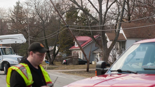 A downed power line causes Griswold Street to close Monday, Feb. 27, in Smiths Creek.