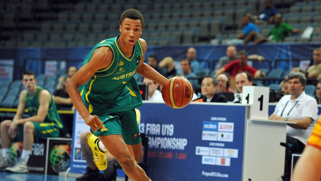 This June 29, 2013 photo provided by FIBA shows Australian basketball player Dante Exum during the FIBA U19 championship match against Brazil in Prague. Exum is a possible pick in the 2014 NBA Draft, Thursday, June 26, 2014 in New York.(AP Photo/FIBA)