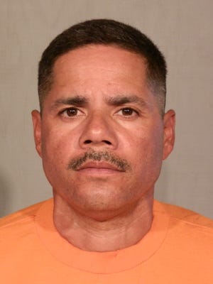 John Albert Campos Sr. was sentenced on Monday to six life sentences without chance of parole for the killing of a retired police officer and then carjacking a witness, the U.S. Department of Justice said.