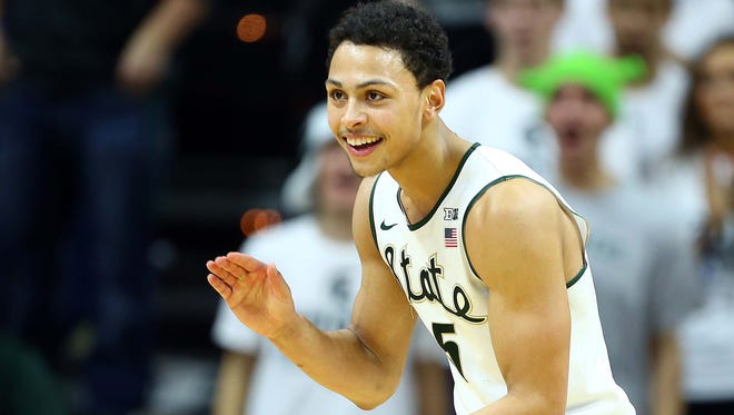 Dec 12, 2015; East Lansing, MI, USA; Michigan State Spartans guard Bryn Forbes (5) reacts to a play against the Florida Gators during the 2nd half of a game at Jack Breslin Student Events Center.