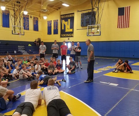 Three-time former NCAA champion Ricky Bonomo addressed youngsters at Northern Lebanon's Wreck Room youth wrestling camp on Thursday.