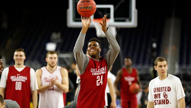 Oklahoma's Buddy Hield shoots during a practice session for the NCAA Final Four college basketball tournament Friday, April 1, 2016, in Houston. (AP Photo/David J. Phillip)