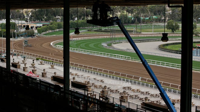 The Clockers' Corner area, the popular morning hangout for owners, trainers, jockeys and fans to watch workouts and grab breakfast, is empty at Santa Anita Park in Arcadia, Calif., Thursday, March 7, 2019. Extensive testing of the dirt track is under way at eerily quiet Santa Anita, where the deaths of 21 thoroughbreds in two months has forced the indefinite cancellation of horse racing and thrown the workaday world of trainers, jockeys and horses into disarray. (AP Photo/Damian Dovarganes)