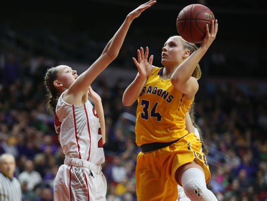 Johnston's Jennah Johnson shoots a lay-up during the
