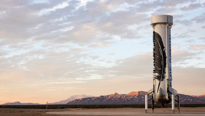 Blue Origin's New Shepard booster after its landing to conclude a successful test flight Monday at the company's private range in West Texas.