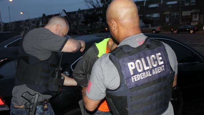 Immigration officers detain suspects in an operation targeting immigration violators in the Philadelphia area from May 14-20.
