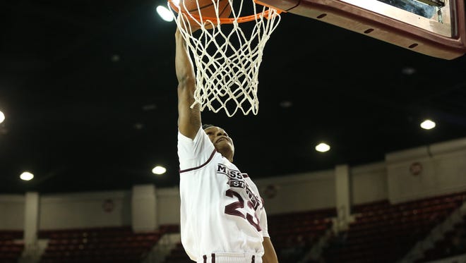 Tyson Carter dunks in a recent Mississippi State game.