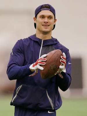 New England Patriots wide receiver Chris Hogan (15) holds a ball before a walk-through begins at a scheduled NFL football team event, Friday, Jan. 27, 2017 in Foxborough, Mass. The Patriots will face the Atlanta Falcons in Super Bowl LI on Feb. 5, 2017, in Houston.