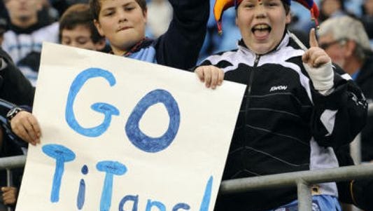 Young Titans fans show their support.
