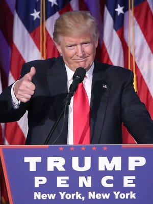 President-elect Donald Trump gives a thumbs up to the crowd during his acceptance speech Nov. 9, 2016, in Manhattan.