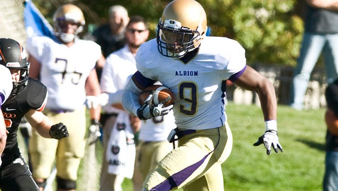 Albion College Jeremy Shephard makes an 46 yard interception in the third quarter.