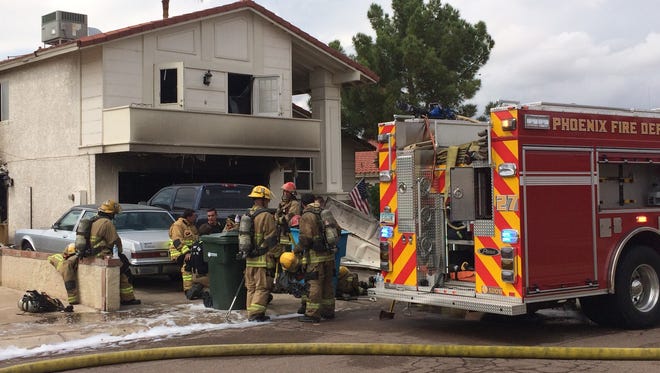Two dogs died from smoke inhalation in a garage fire at a Phoenix house on Sept. 22, 2016.
