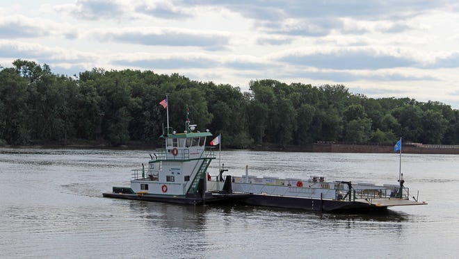 The Cassville ferry's locking mechanism allows the tugboat part of it to swing out 180 degrees, then connect to the barge that carries vehicles.