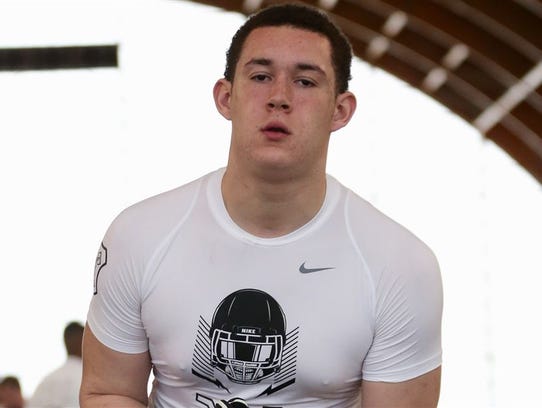 Jalen Mayfield is a 4-star OT from Grand Rapids Catholic