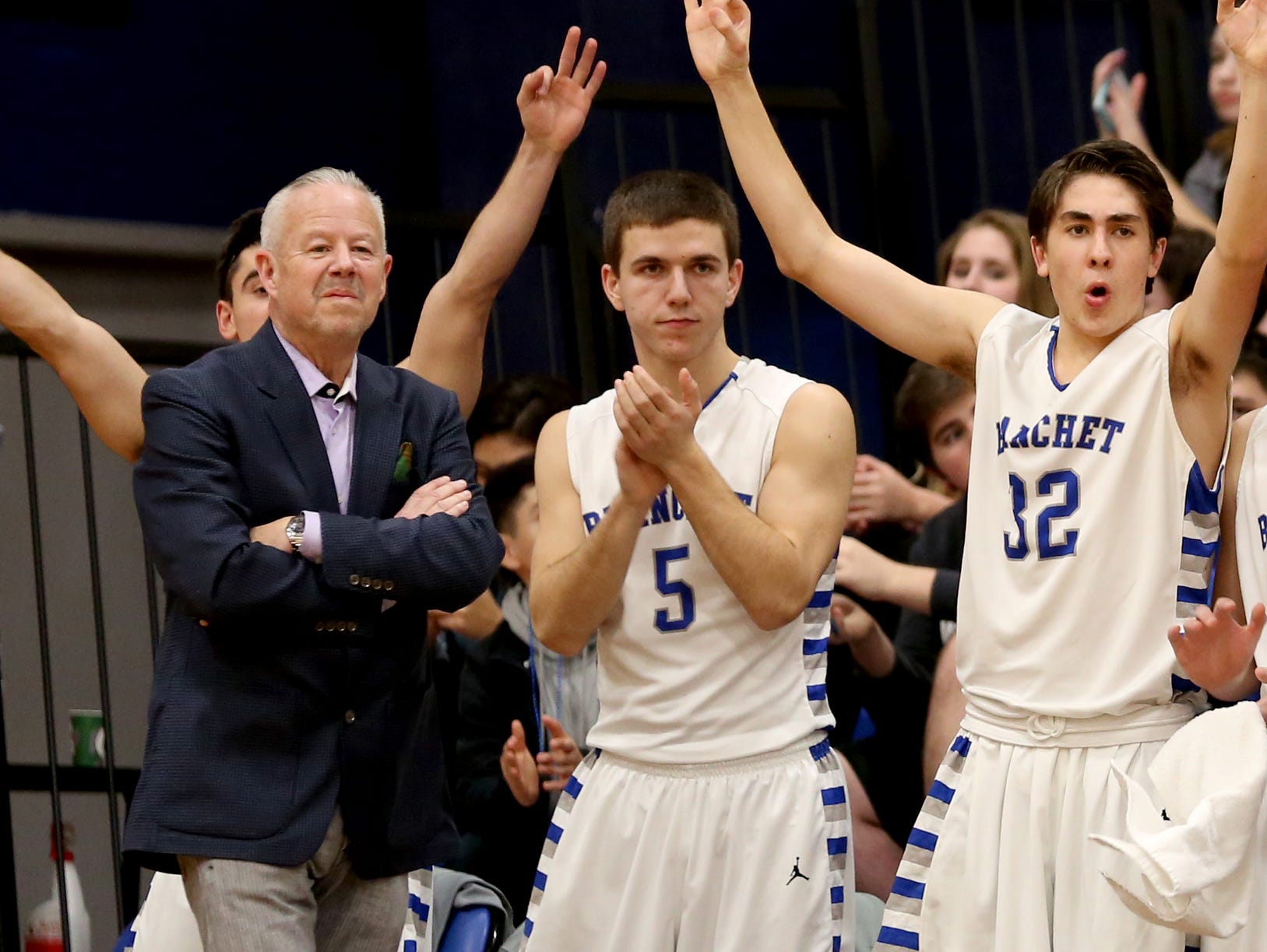 The Blanchet bench celebrates a play behind coach Scott Cantonwine in the Colton vs. Blanchet boy's basketball game at Blanchet Catholic School in Salem on Tuesday, Feb. 9, 2016.