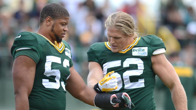 Green Bay Packers linebackers Nick Perry, left, and Clay Matthews during a 2013 training camp practice at Ray Nitschke Field.