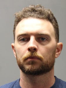 Arron Wright, 34, of Milford, has been charged with strangulation, second-degree assault, second-degree unlawful imprisonment and three counts of endangering the welfare of a child.