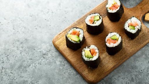Homemade salmon avocado sushi rolls