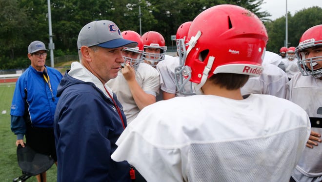 Chenango Forks coach Dave Hogan speaks to players during practice on Thursday August 31, 2017.