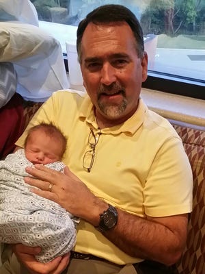 Bruce Richardson survived a heart attack and was able to welcome his fourth grandchild, Joshua, into the world.