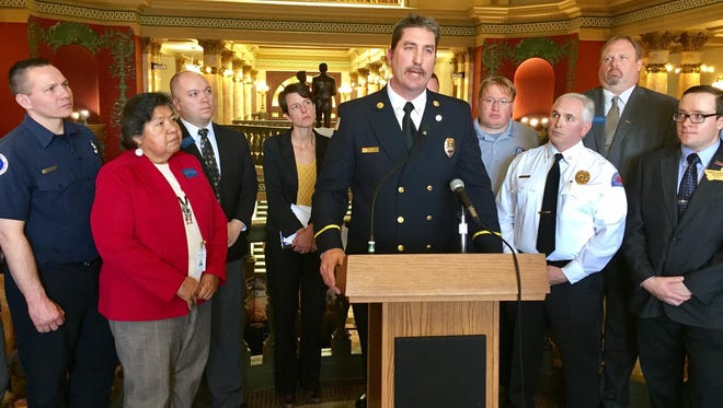 Great Falls Fire Department Battalion Chief Dave Von Son speaks at the state Capitol about Senate Bill 72 being defeated by a House committee.
