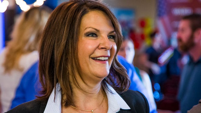 State Sen. Kelli Ward talks to members of the press after officially announcing on July 14, 2015, that she is running against Sen. John McCain for US Senate.