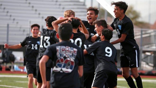 Gila Ridge celebrates after defeating Cortez in the 4A boys soccer final at Williams Field High School in Gilbert on February 10, 2018.