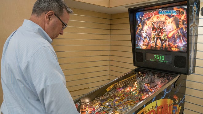 Doug Wildey plays his favorite pinball game, Ye Olde Medieval Madness.
