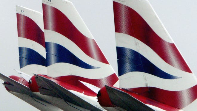 British Airways aircraft are seen at London Heathrow on May 16, 2003.