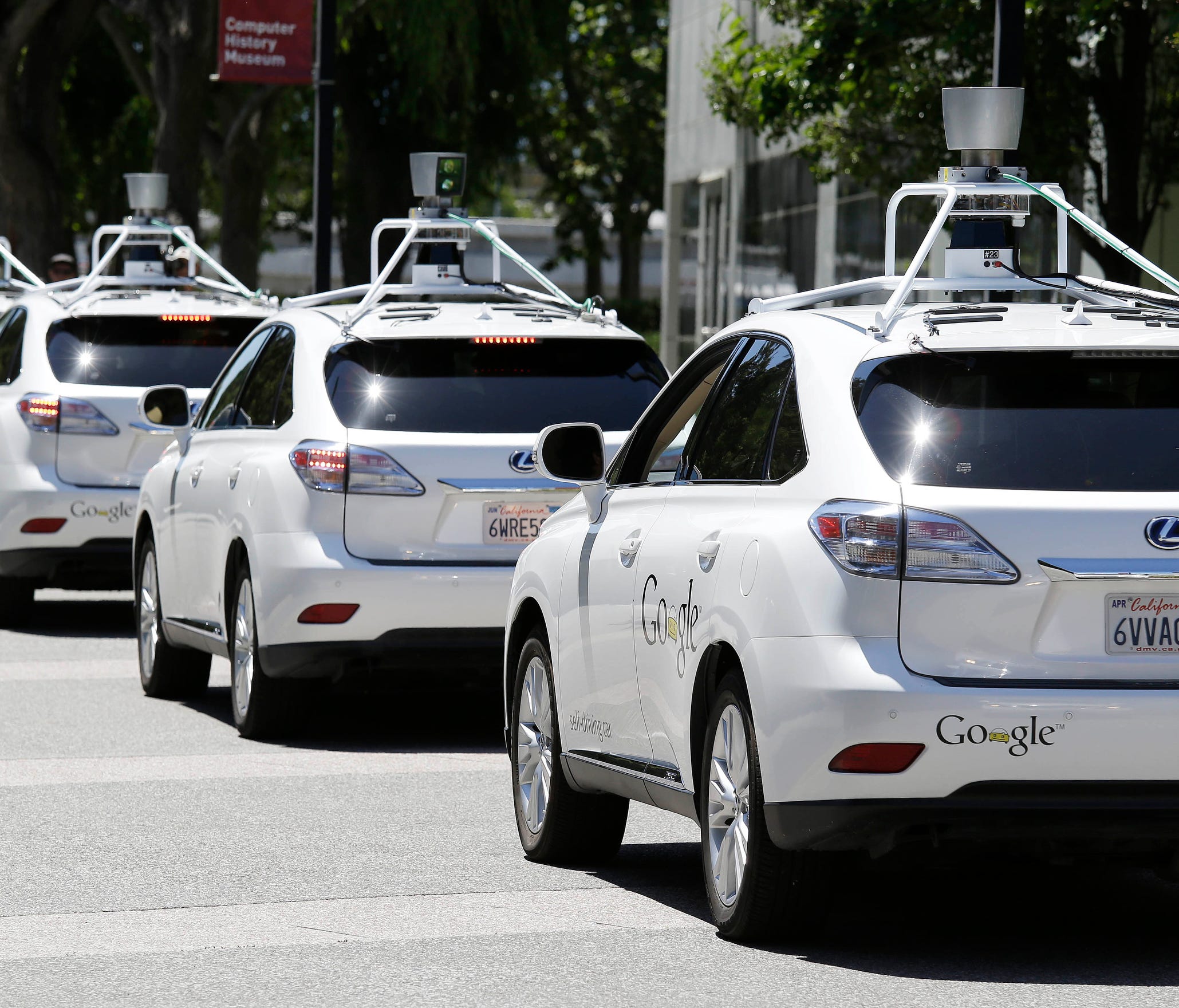 A row of Google self-driving cars outside the Computer History Museum in Mountain View, Calif. in this 2014 photo