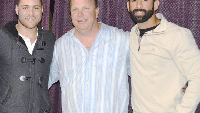Chipola College baseball coach Jeff Johnson (center) with former players Russell Martin (left, Toronto Blue Jays) and Jose Bautista (Blue Jays).