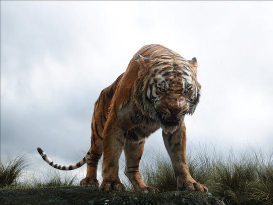 In this image released by Disney, Shere Khan the tiger,
