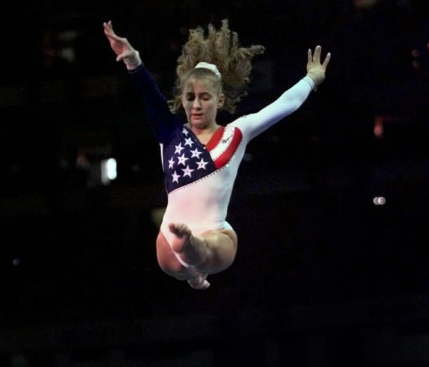 Shannon Miller performs a balance beam routine at a Summer Olympics gymnastics gala, Atlanta, July 30, 1996.