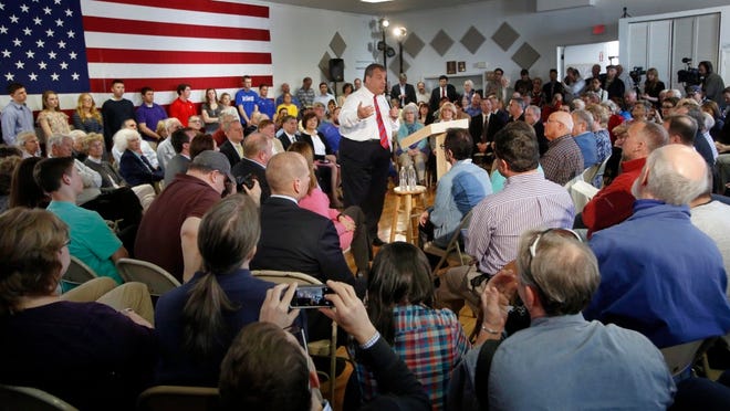 Gov. Chris Christie takes questions during a town hall meeting with area residents in Londonderry, N.H., Wednesday, April 15, 2015. (AP Photo/Jim Cole)