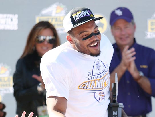 LSU running back Derrius Guice celebrates after being