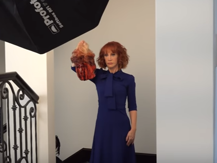 Comedian Kathy Griffin poses with a fake decapitated head of President Trump.