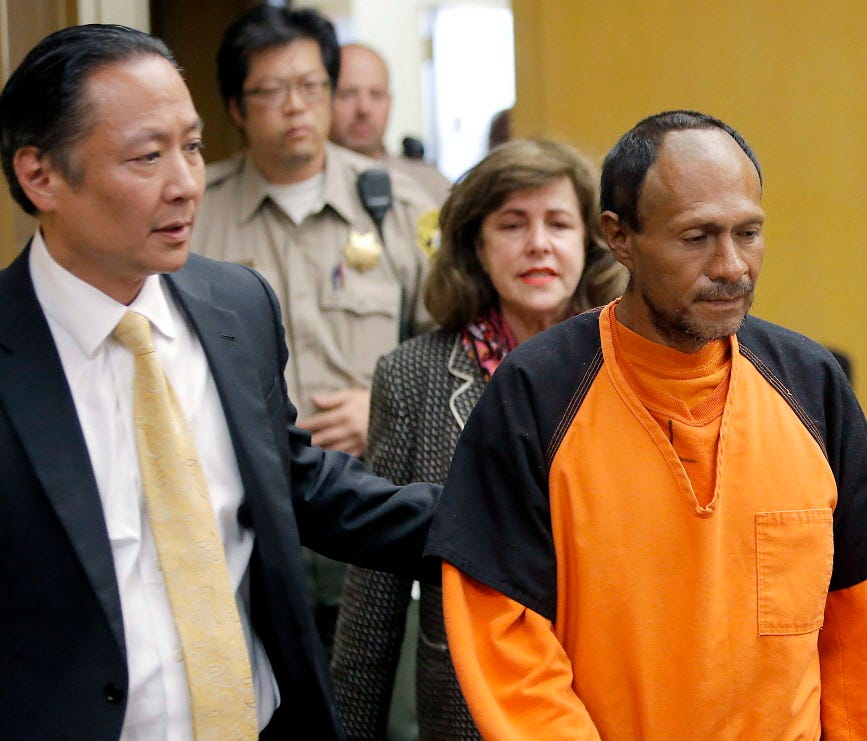 Jose Ines Garcia Zarate, right, is lead into the courtroom July 7, 2015, by San Francisco Public Defender Jeff Adachi, left, and Assistant District Attorney Diana Garciaor, center, for his arraignment at the Hall of Justice in San Francisco.