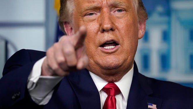 President Donald Trump gestures while speaking during a news conference at the White House, Wednesday, Sept. 16, 2020, in Washington.